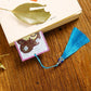 A book with diamond painting bookmark with tassel